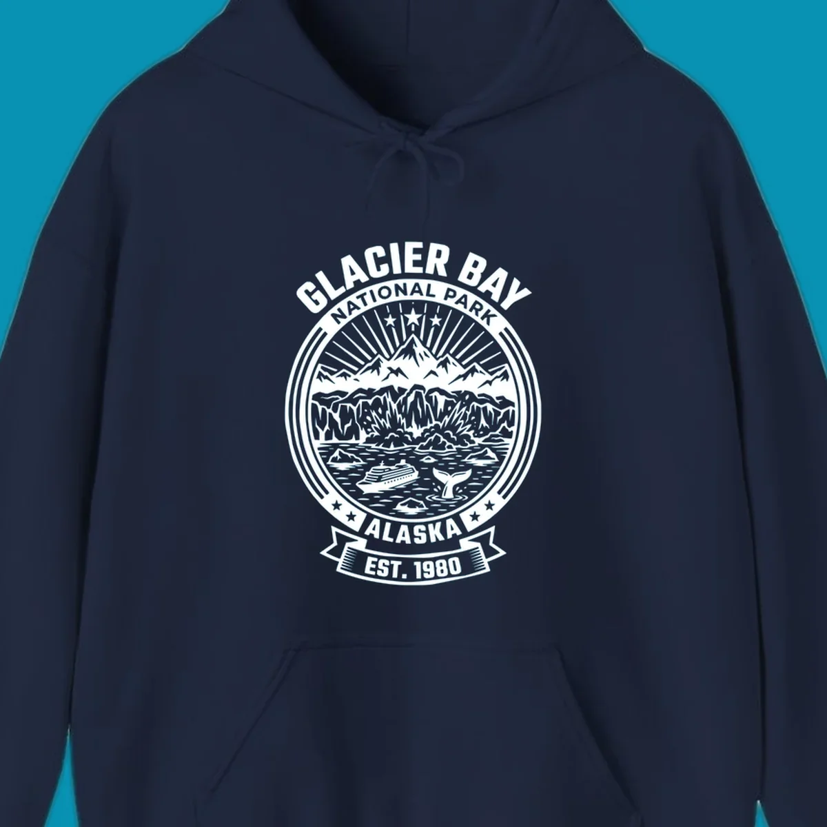 Glacier Bay National Park circular badge with mountains, cruise ship, whale tail, and icebergs, established 1980