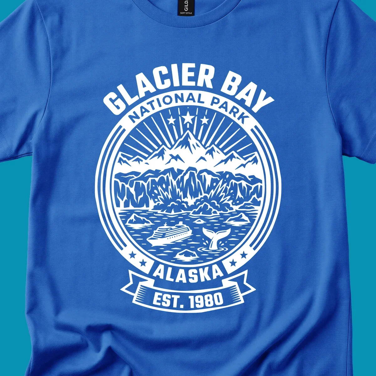 Glacier Bay National Park circular badge with mountains, cruise ship, whale tail, and icebergs, established 1980