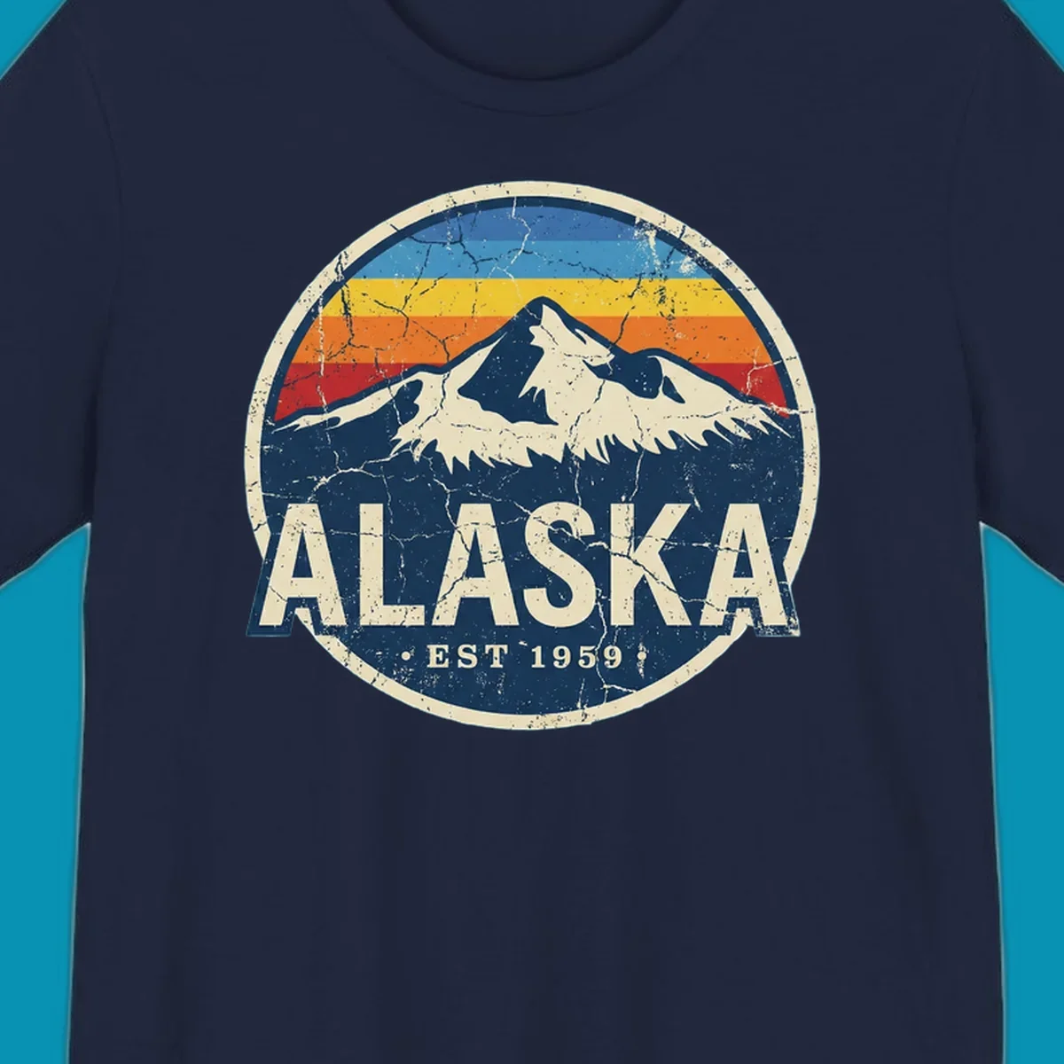 Vintage circular badge with snow-capped Alaska mountain, retro rainbow stripes, and distressed cream border featuring 'ALASKA EST 1959' text