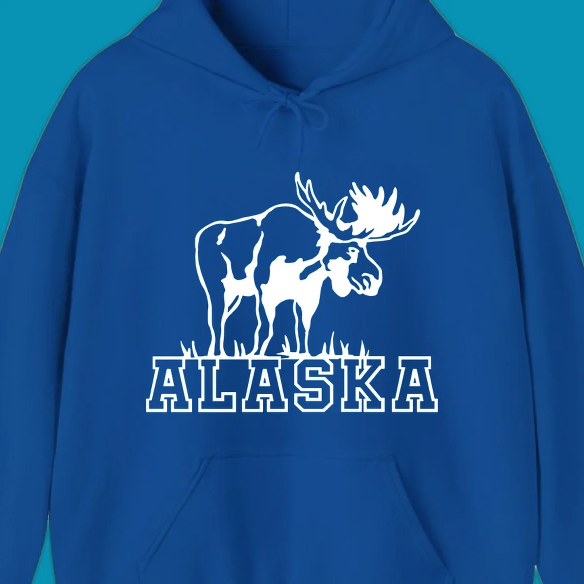 White silhouette of a majestic moose with large antlers standing with grass below and ALASKA text, moose-alaska-silhouette design