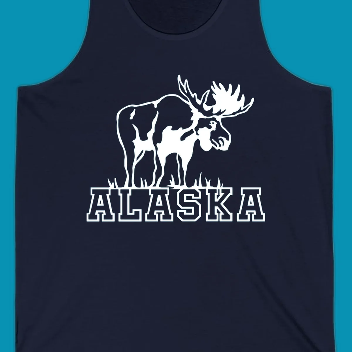 White silhouette of a majestic moose with large antlers standing with grass below and ALASKA text, moose-alaska-silhouette design