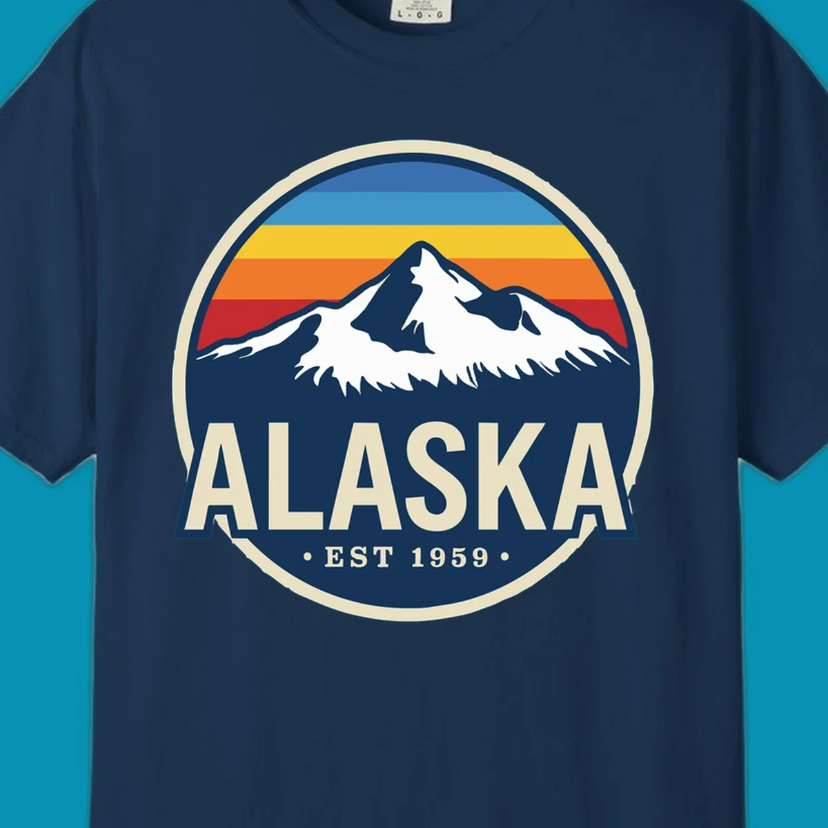 A circular alaska-mountain-range-sunset-badge design with retro stripes and white peaks above bold Alaska text.