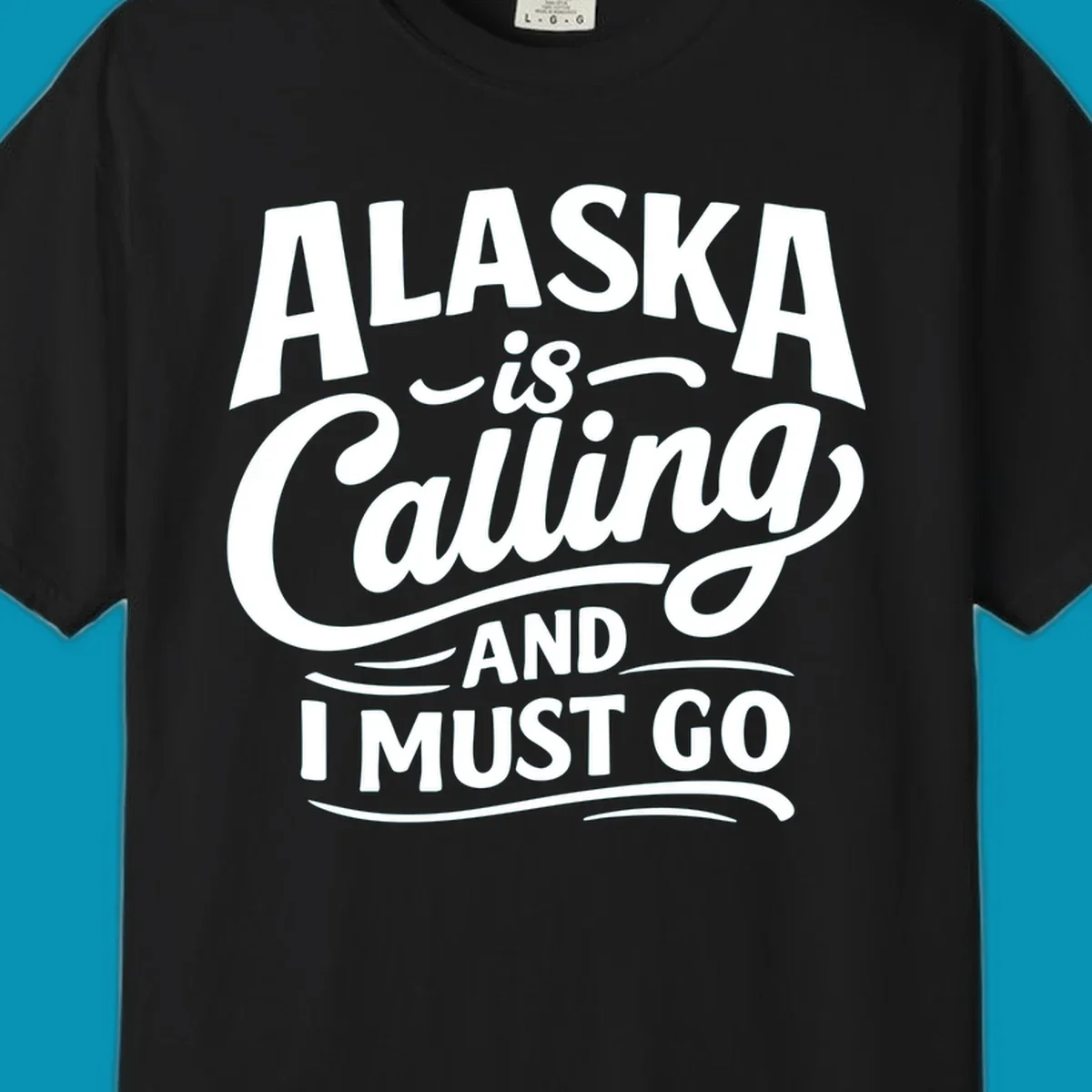 A white typography design on a black background reading Alaska is Calling and I Must Go in mixed fonts.