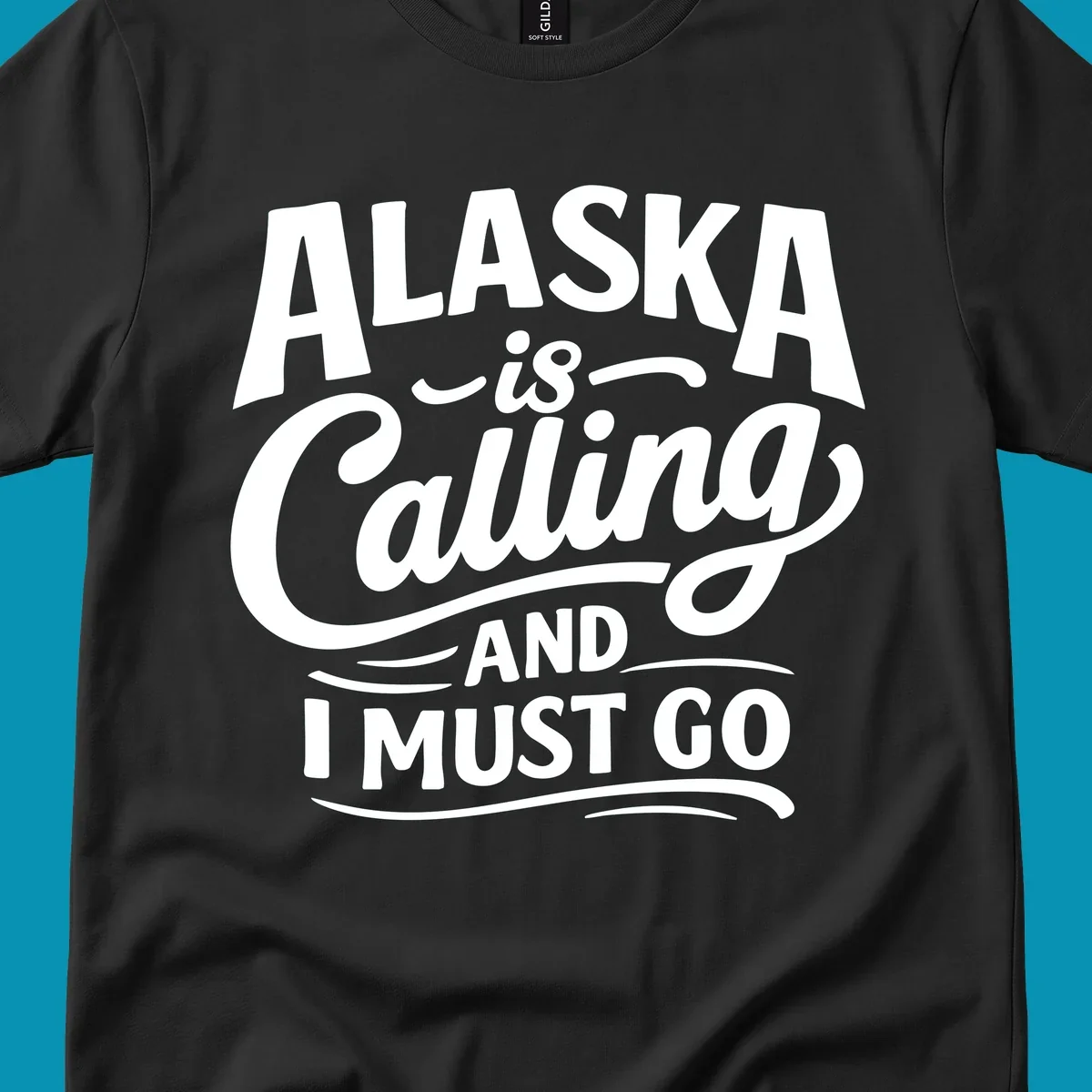 A white typography design on a black background reading Alaska is Calling and I Must Go in mixed fonts.