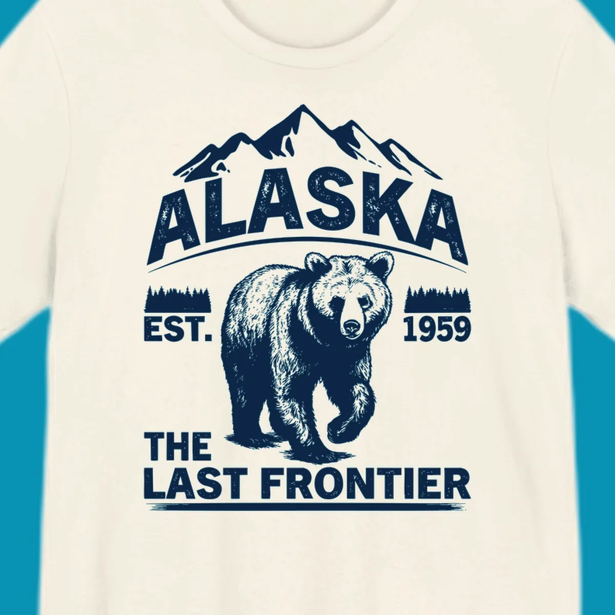 White graphic of a walking grizzly bear under mountain peaks with alaska-grizzly-frontier-mountains text.