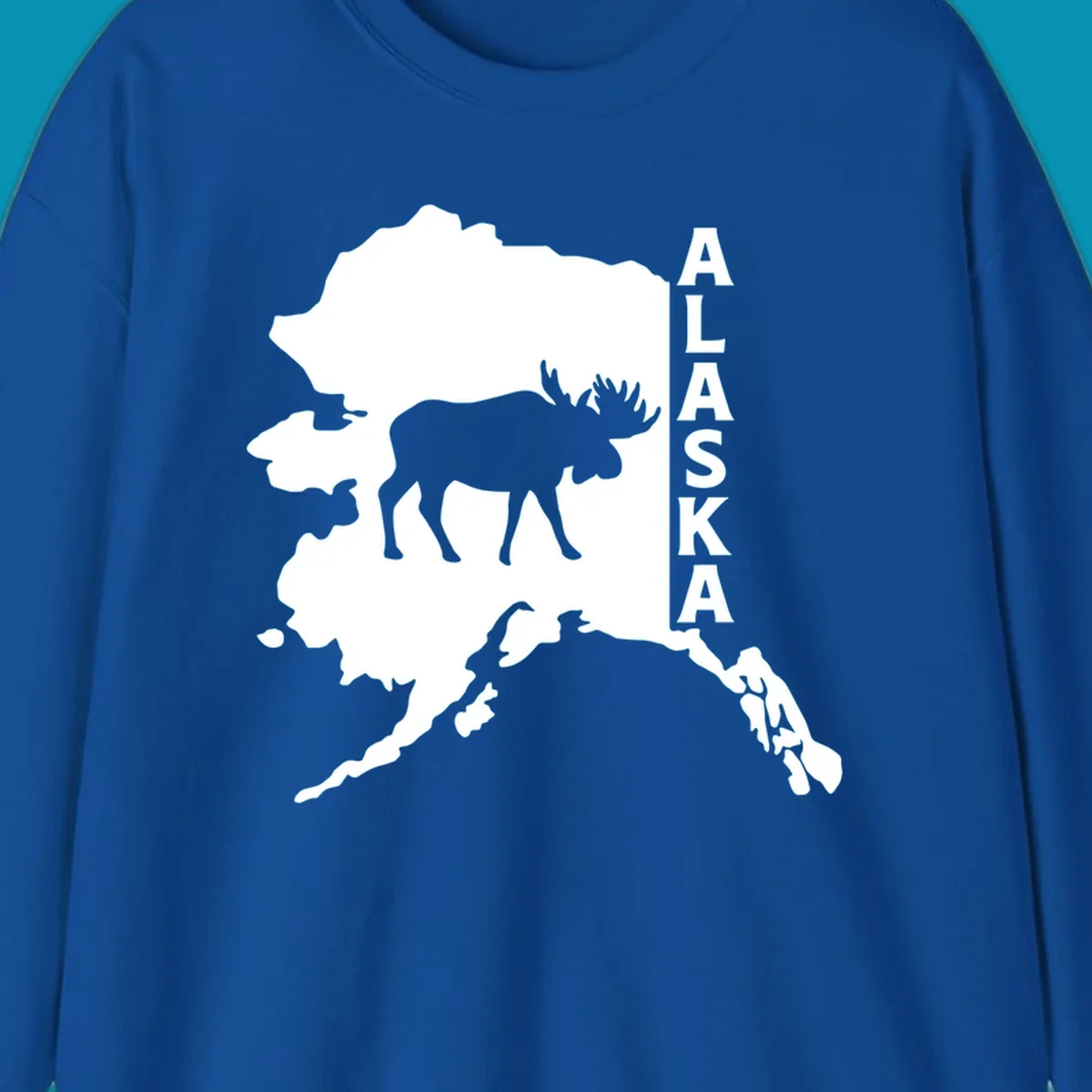 Bold white Alaska state map silhouette featuring a black moose and vertical ALASKA text.