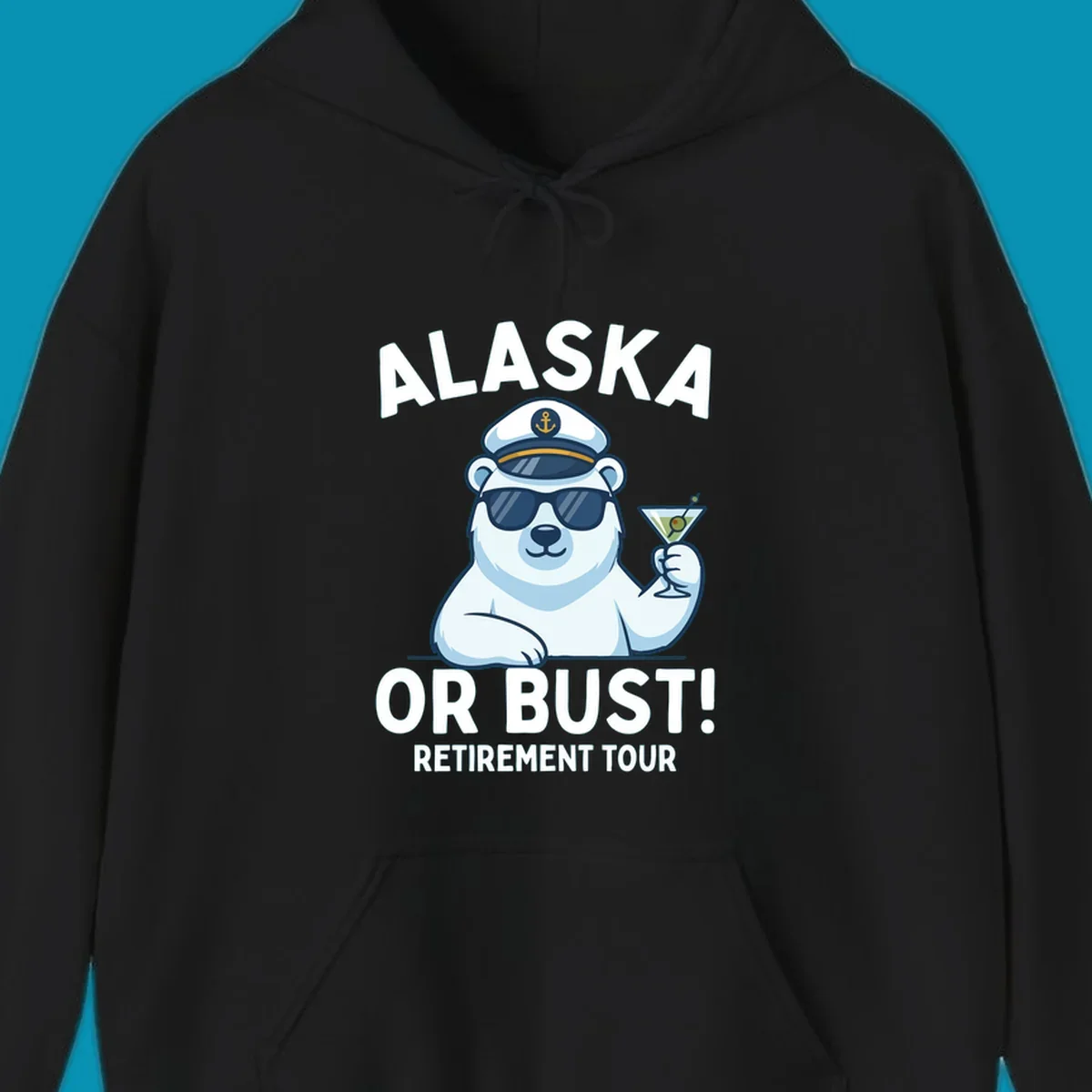 A cartoon polar bear wearing a captain's hat and sunglasses holds a martini, with the text "ALASKA OR BUST! MY RETIREMENT TOUR" above and below, representing a polar-bear-retirement-cruise.