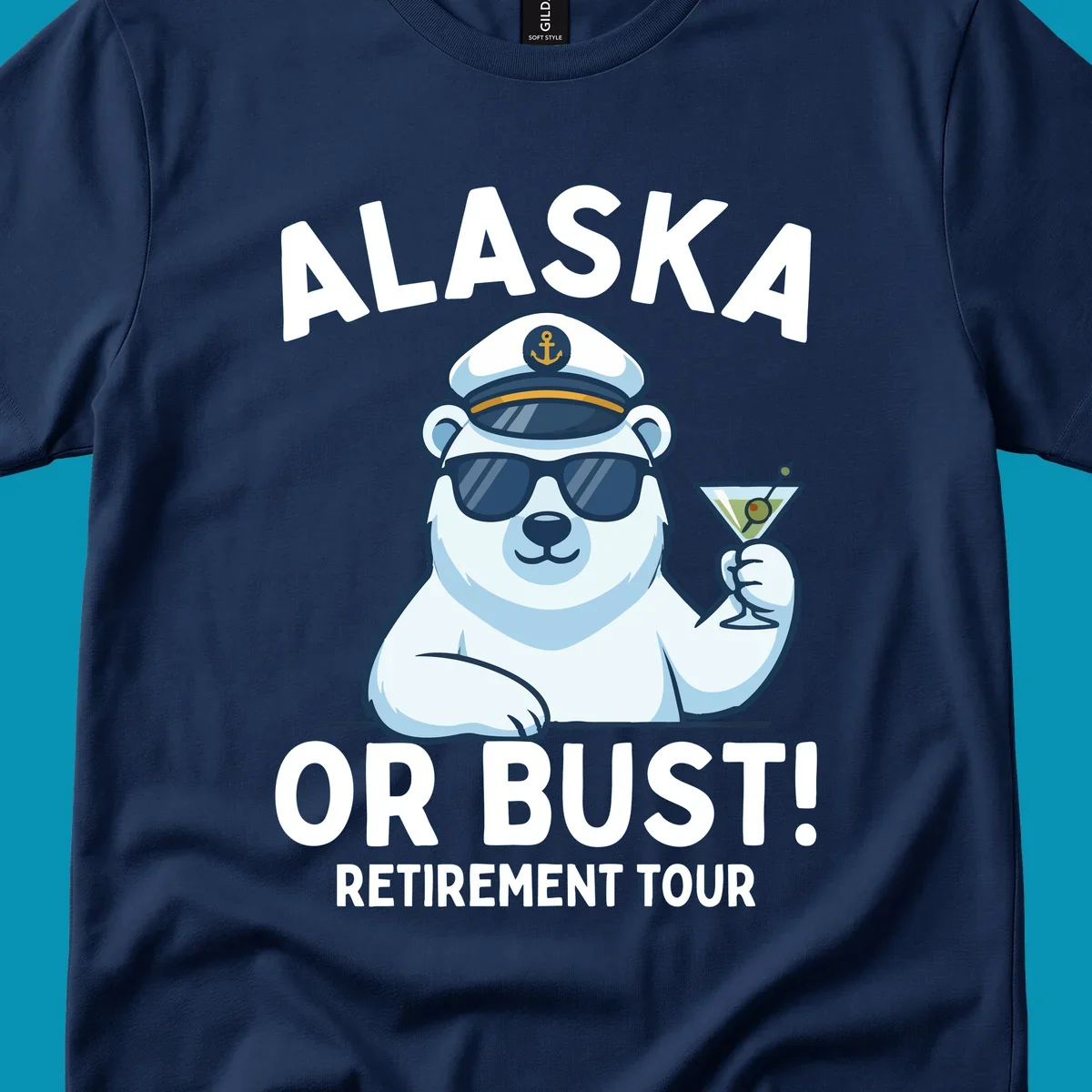 A cartoon polar bear wearing a captain's hat and sunglasses holds a martini, with the text "ALASKA OR BUST! MY RETIREMENT TOUR" above and below, representing a polar-bear-retirement-cruise.
