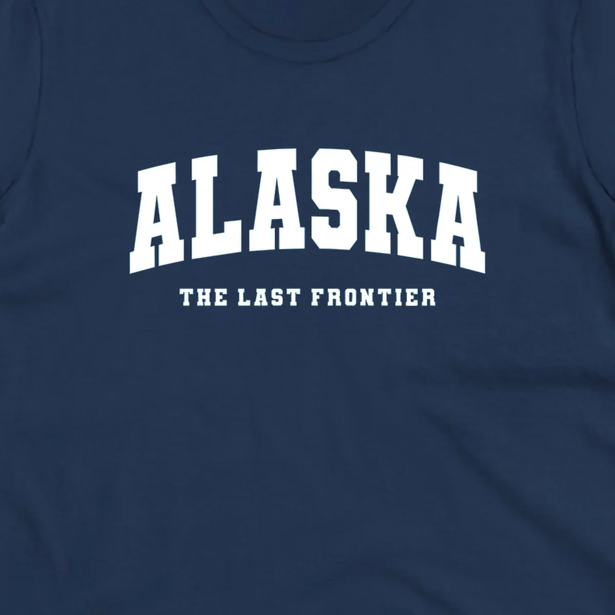 White block lettering on a black background reads 'ALASKA THE LAST FRONTIER', with 'ALASKA' larger. Design concept: alaska-last-frontier-typography.