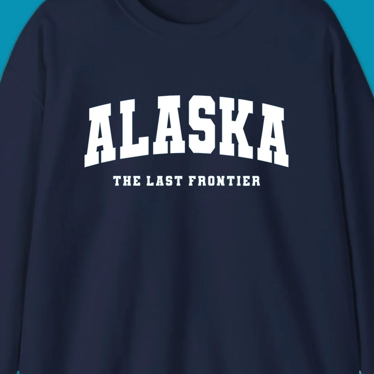 White block lettering on a black background reads 'ALASKA THE LAST FRONTIER', with 'ALASKA' larger. Design concept: alaska-last-frontier-typography.