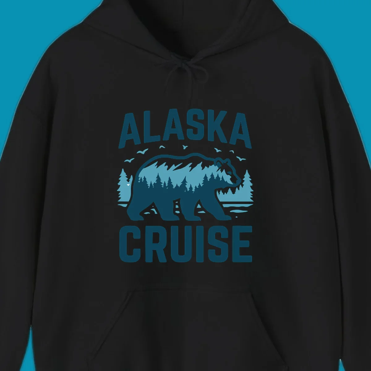 An illustrated design with 'ALASKA' and 'CRUISE' text, featuring a walking alaska-bear-mountain-silhouette filled with a forest and mountain landscape, surrounded by trees, birds, and water.