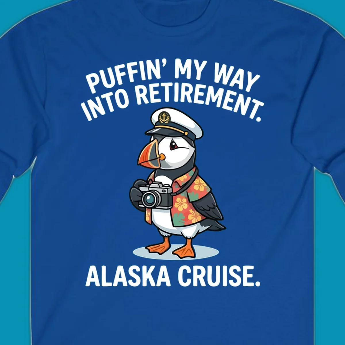 A cartoon puffin wearing a captain's hat and Hawaiian shirt holds a camera, with text 'PUFFIN' INTO MY RETIREMENT. ALASKA CRUISE.' for a puffin-into-retirement-cruise.