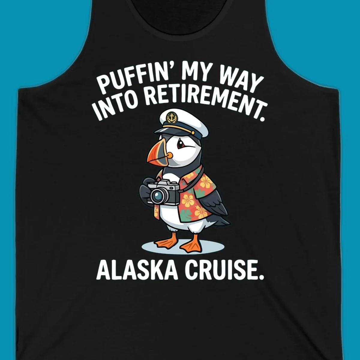 A cartoon puffin wearing a captain's hat and Hawaiian shirt holds a camera, with text 'PUFFIN' INTO MY RETIREMENT. ALASKA CRUISE.' for a puffin-into-retirement-cruise.