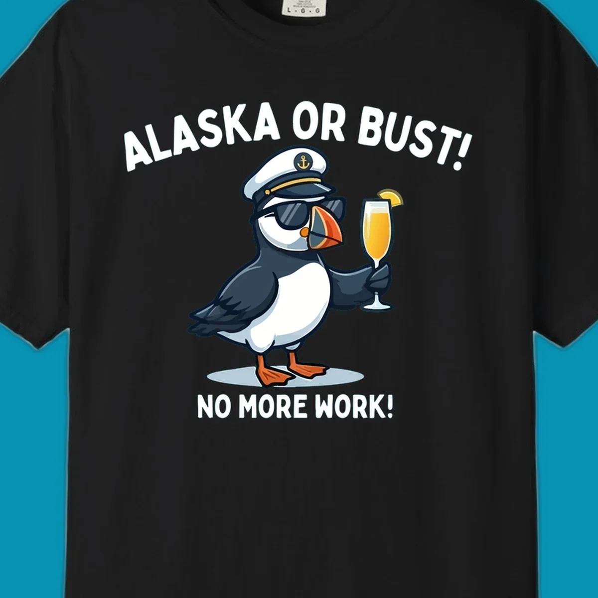 An illustrated puffin captain in sunglasses and a hat holds a cocktail with a lemon slice, with 'ALASKA OR BUST!' and 'NO MORE WORK!' text, representing the alaska-or-bust-captain-puffin concept.