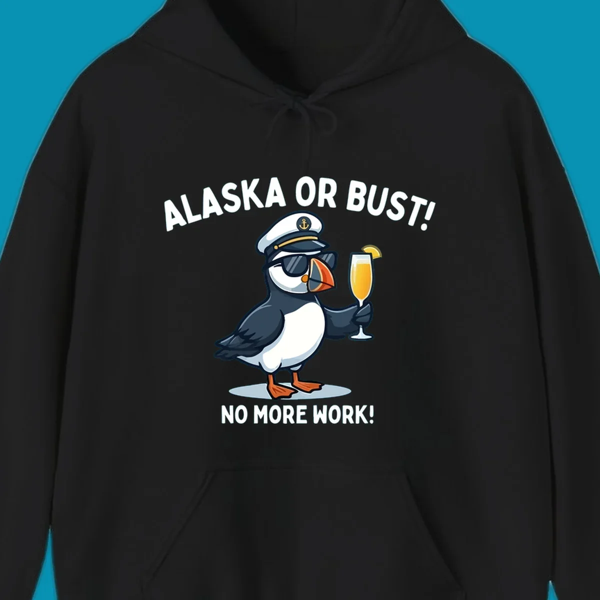 An illustrated puffin captain in sunglasses and a hat holds a cocktail with a lemon slice, with 'ALASKA OR BUST!' and 'NO MORE WORK!' text, representing the alaska-or-bust-captain-puffin concept.