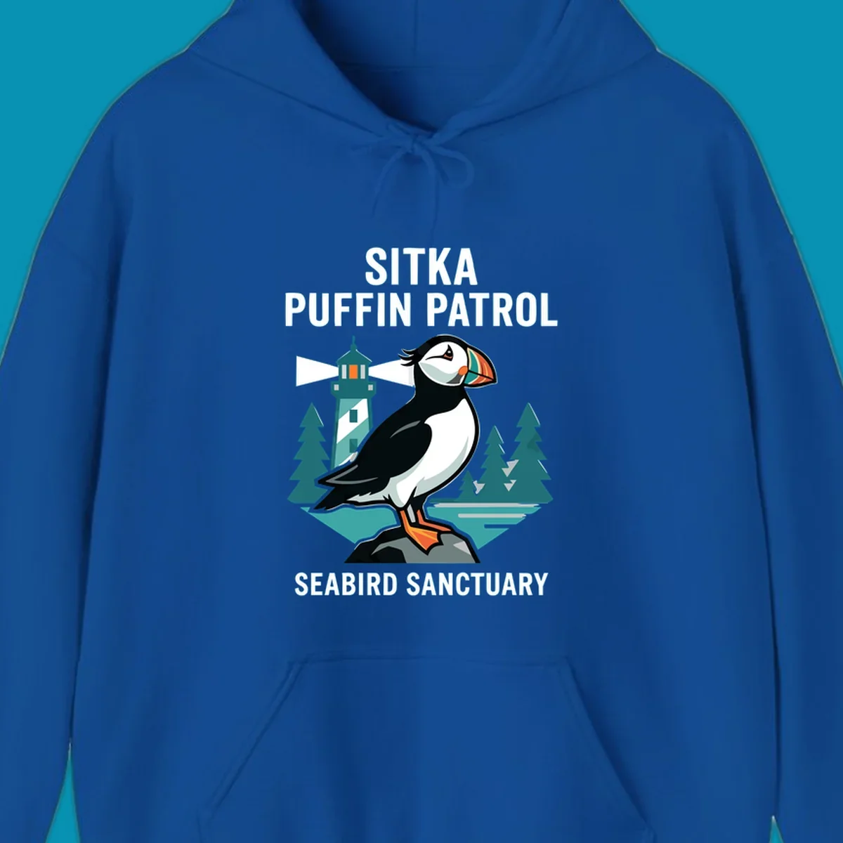 An illustration featuring a puffin on a rock with a lighthouse and pine trees in the background, with text 'SITKA PUFFIN PATROL SEABIRD SANCTUARY'. This design highlights the sitka-puffin-patrol theme.