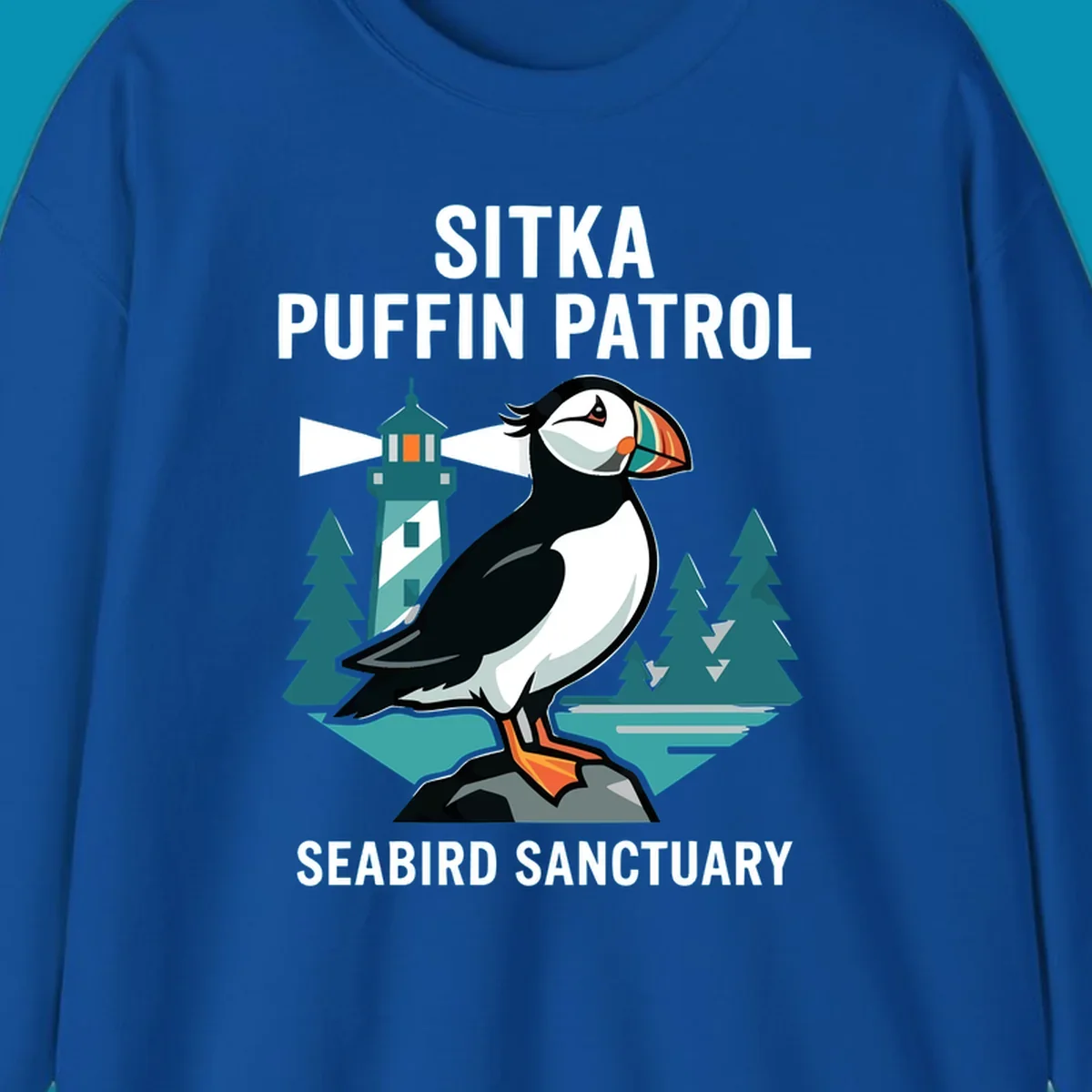 An illustration featuring a puffin on a rock with a lighthouse and pine trees in the background, with text 'SITKA PUFFIN PATROL SEABIRD SANCTUARY'. This design highlights the sitka-puffin-patrol theme.