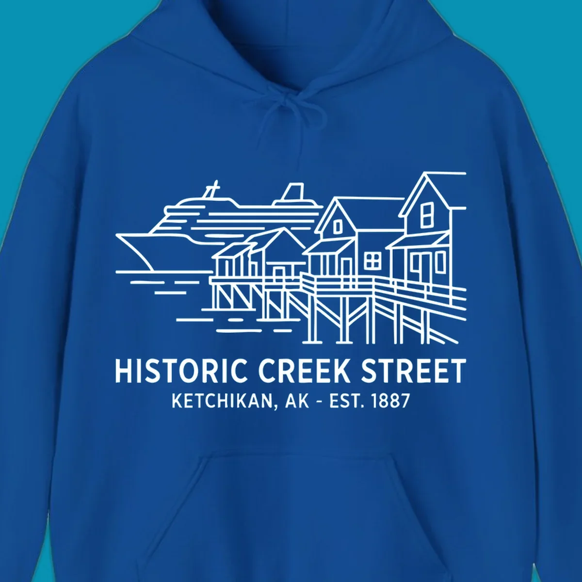 White line art illustration of Historic Creek Street in Ketchikan, Alaska, with a cruise ship, waterfront buildings, and text.