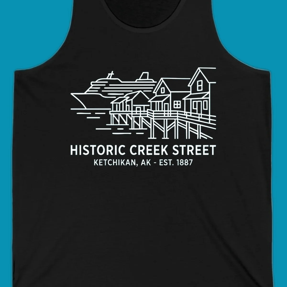 White line art illustration of Historic Creek Street in Ketchikan, Alaska, with a cruise ship, waterfront buildings, and text.