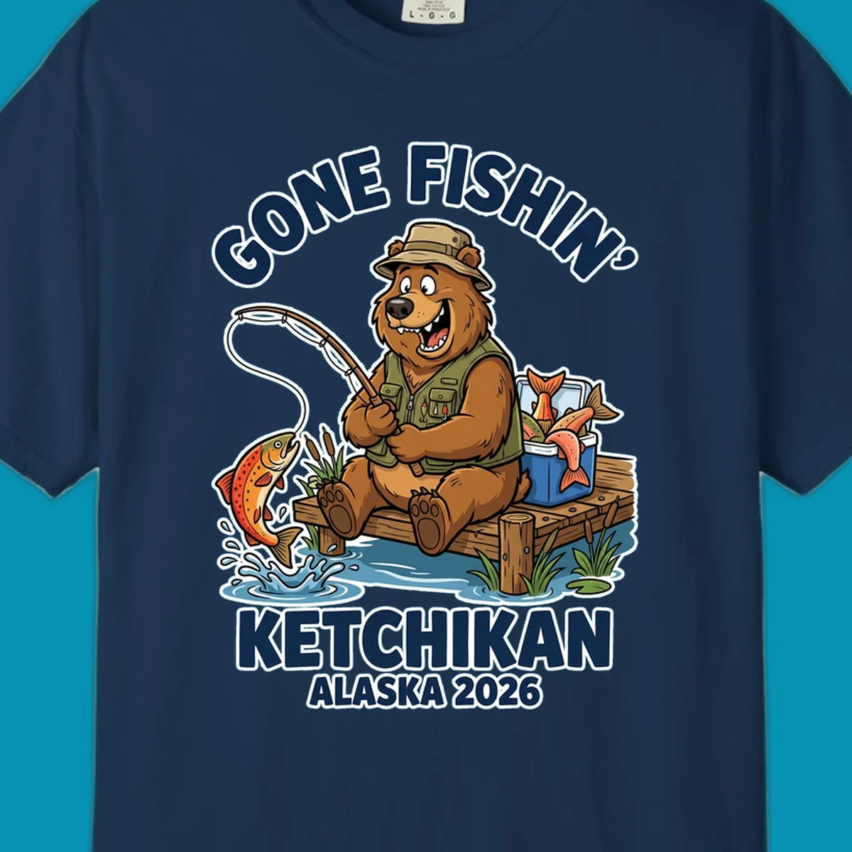 Cartoon bear in hat and vest fishing from a dock, with a fish on the line and cooler. Text: 'GONE FISHIN' KETCHIKAN ALASKA 2026'. Ideal for a gone-fishin-ketchikan-bear themed Alaska cruise.
