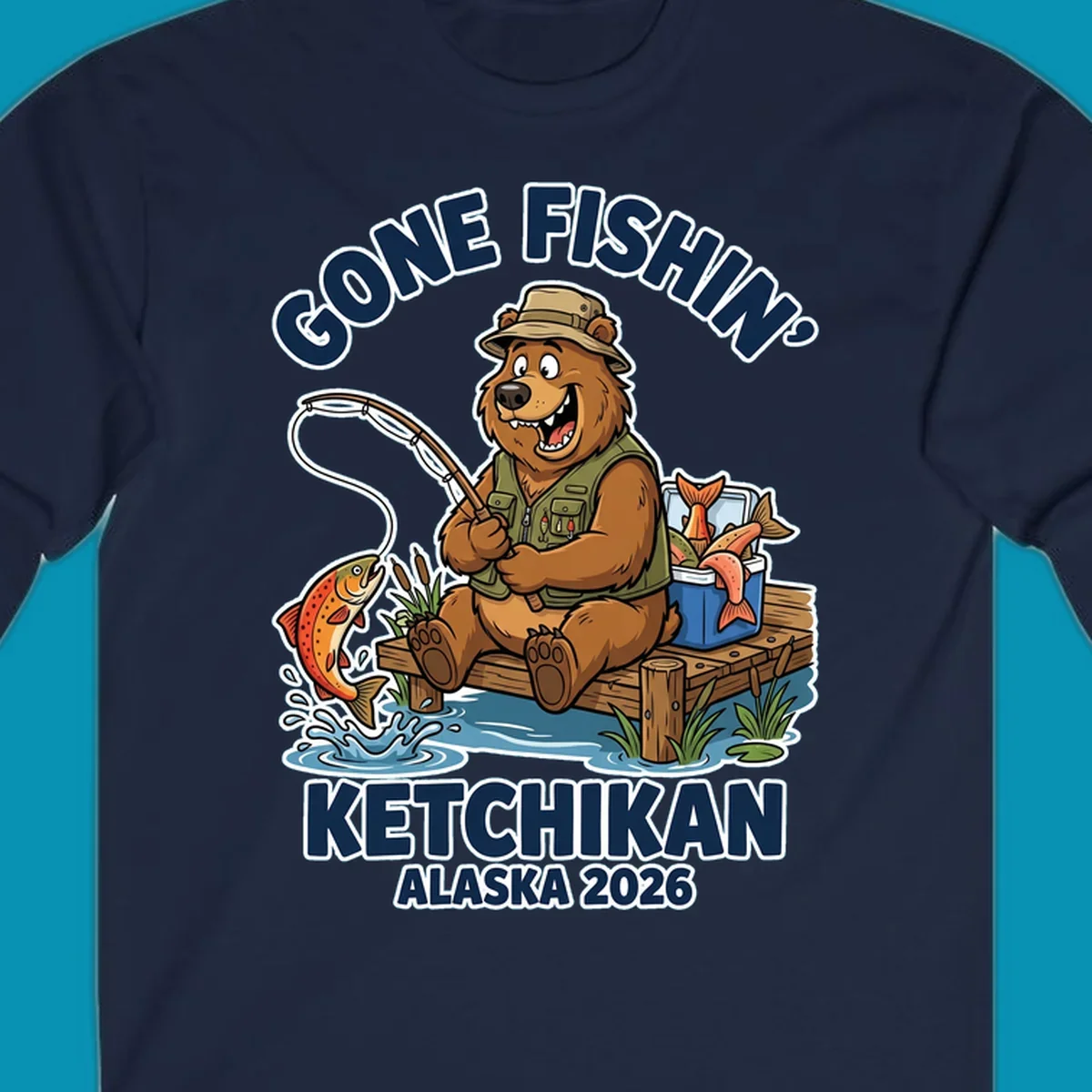 Cartoon bear in hat and vest fishing from a dock, with a fish on the line and cooler. Text: 'GONE FISHIN' KETCHIKAN ALASKA 2026'. Ideal for a gone-fishin-ketchikan-bear themed Alaska cruise.