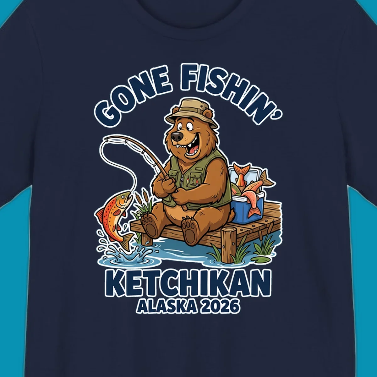 Cartoon bear in hat and vest fishing from a dock, with a fish on the line and cooler. Text: 'GONE FISHIN' KETCHIKAN ALASKA 2026'. Ideal for a gone-fishin-ketchikan-bear themed Alaska cruise.