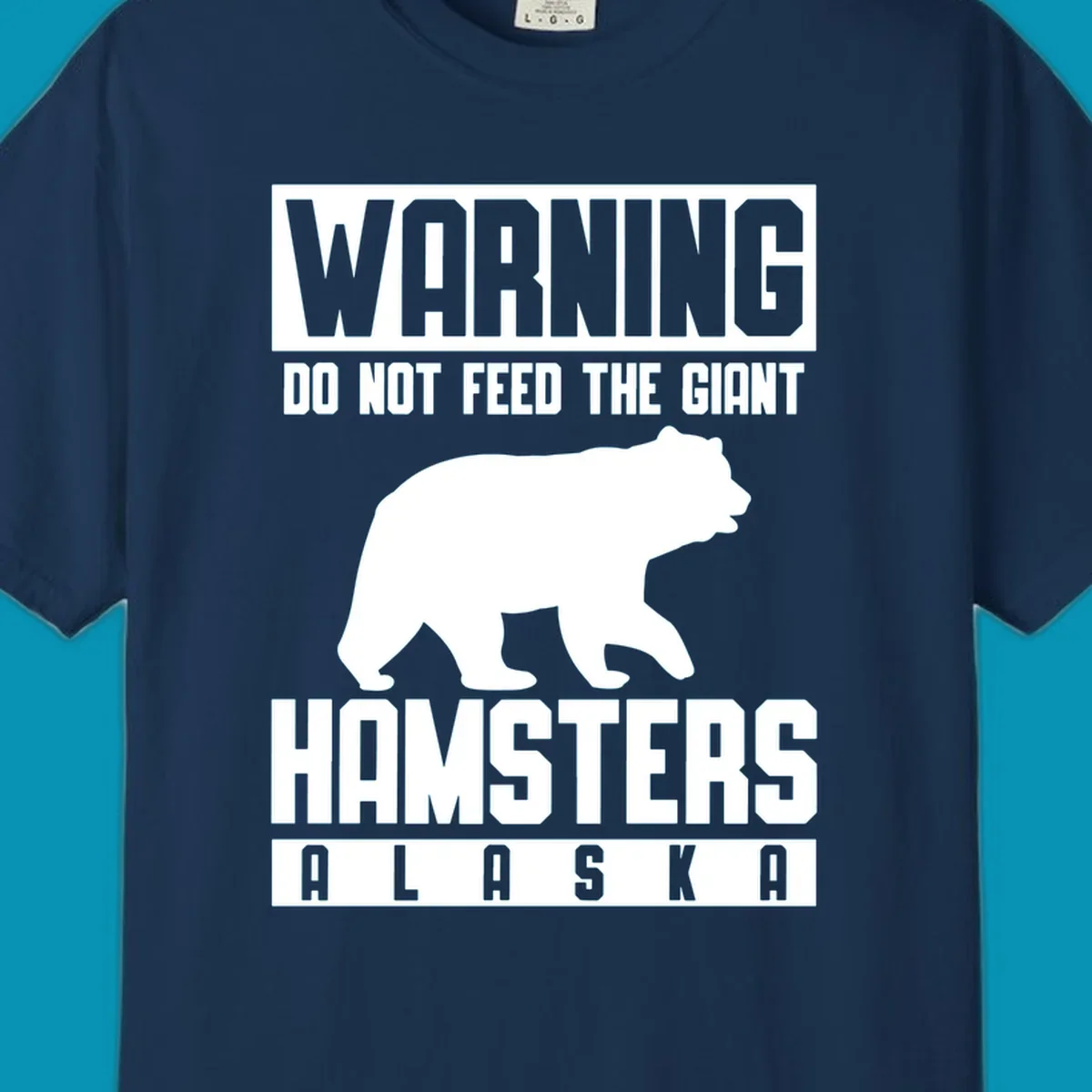 Warning design with white bear silhouette and bold text reading 'Do Not Feed The Giant Hamsters Alaska' on gray background