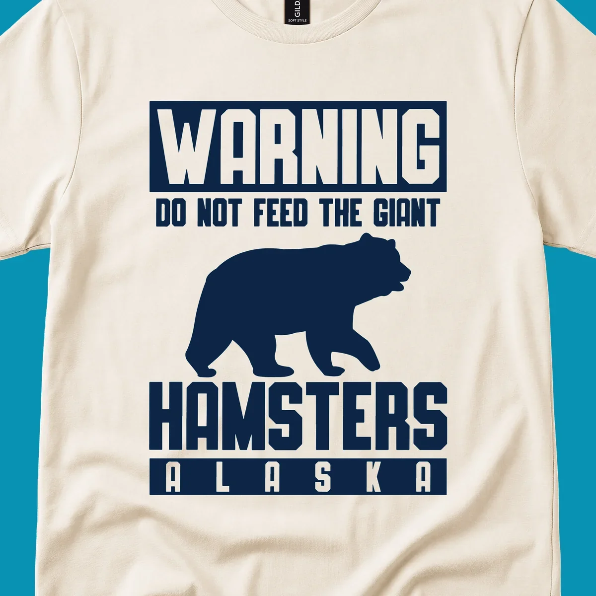 Warning design with white bear silhouette and bold text reading 'Do Not Feed The Giant Hamsters Alaska' on gray background