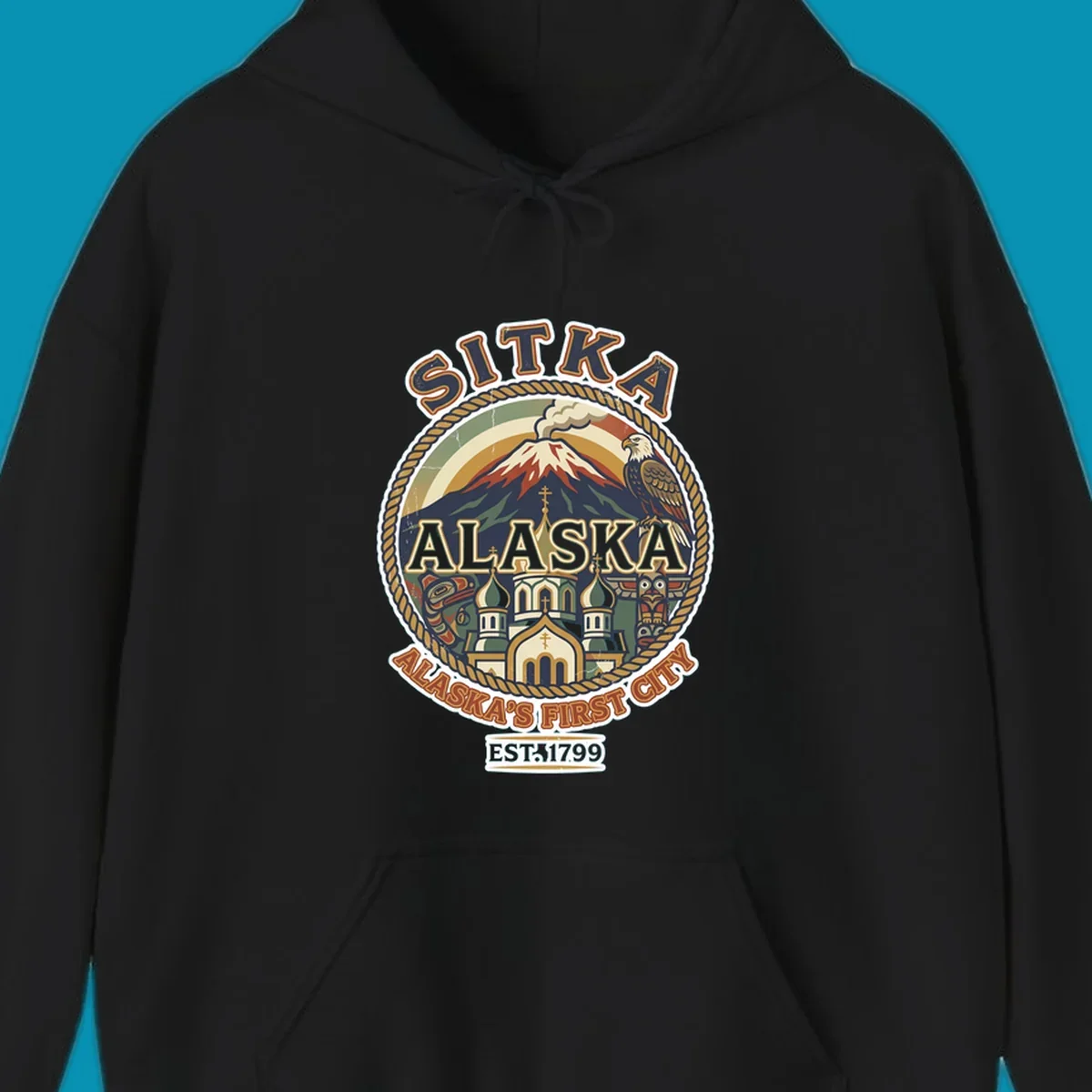 Vintage circular badge design for Sitka Alaska's First City, featuring snow-capped mountain, Russian Orthodox church, bald eagle, and totem pole, established 1799.