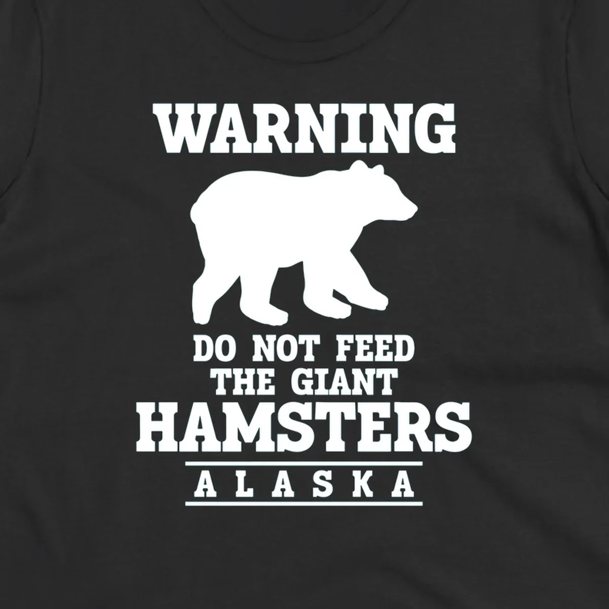 White bear silhouette with bold warning text reading 'Do Not Feed The Giant Hamsters Alaska' on gray background