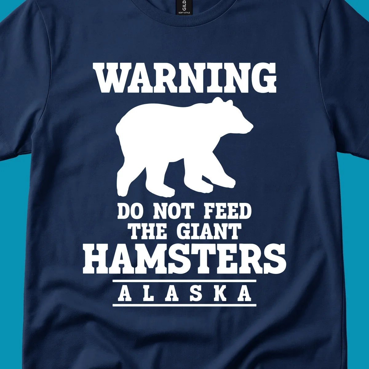White bear silhouette with bold warning text reading 'Do Not Feed The Giant Hamsters Alaska' on gray background