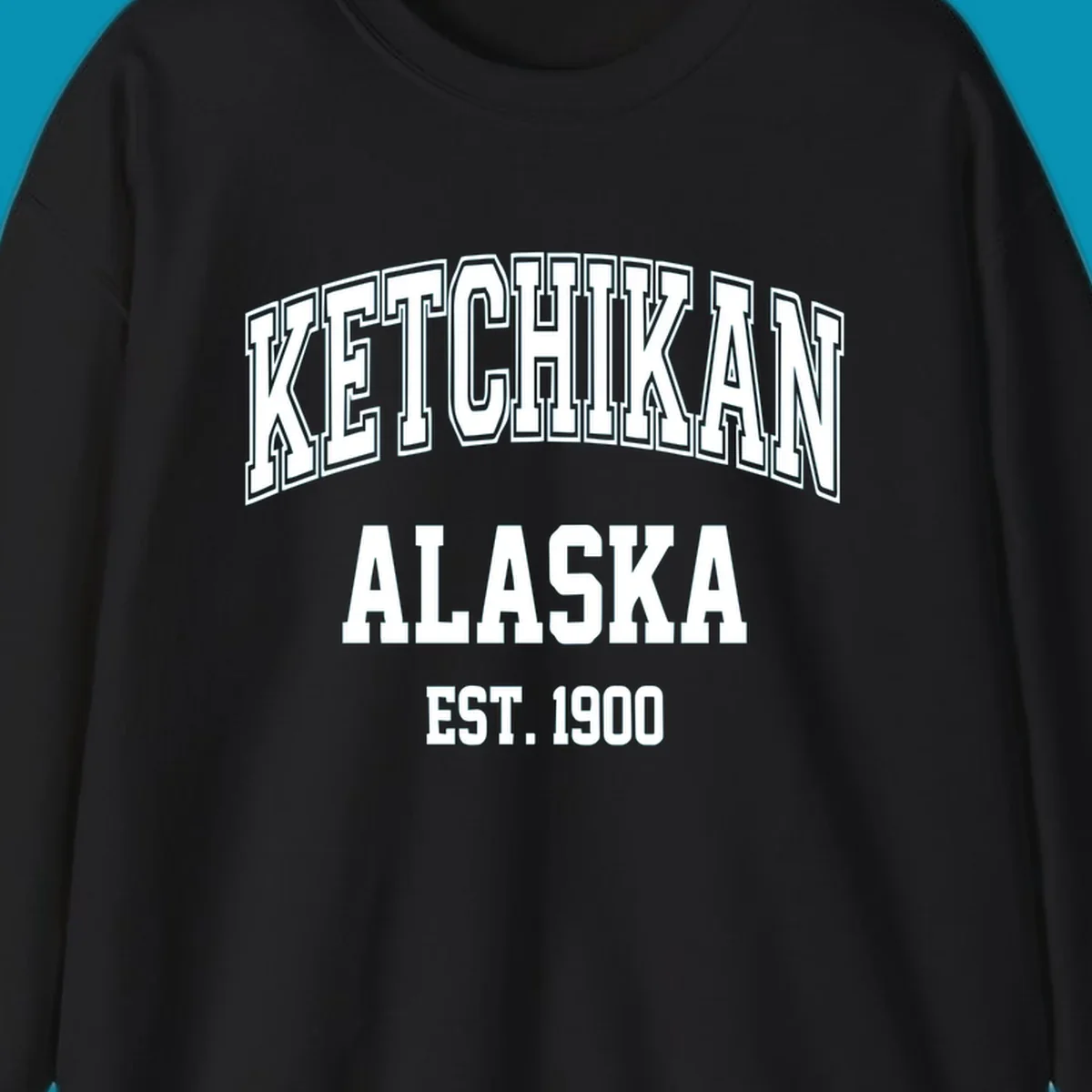 Ketchikan Alaska vintage design with outlined lettering and EST. 1900 date in retro athletic style