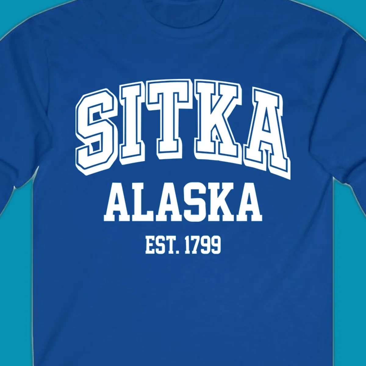Vintage badge design reading Sitka Alaska Est. 1799 in bold outlined and solid white lettering on gray background