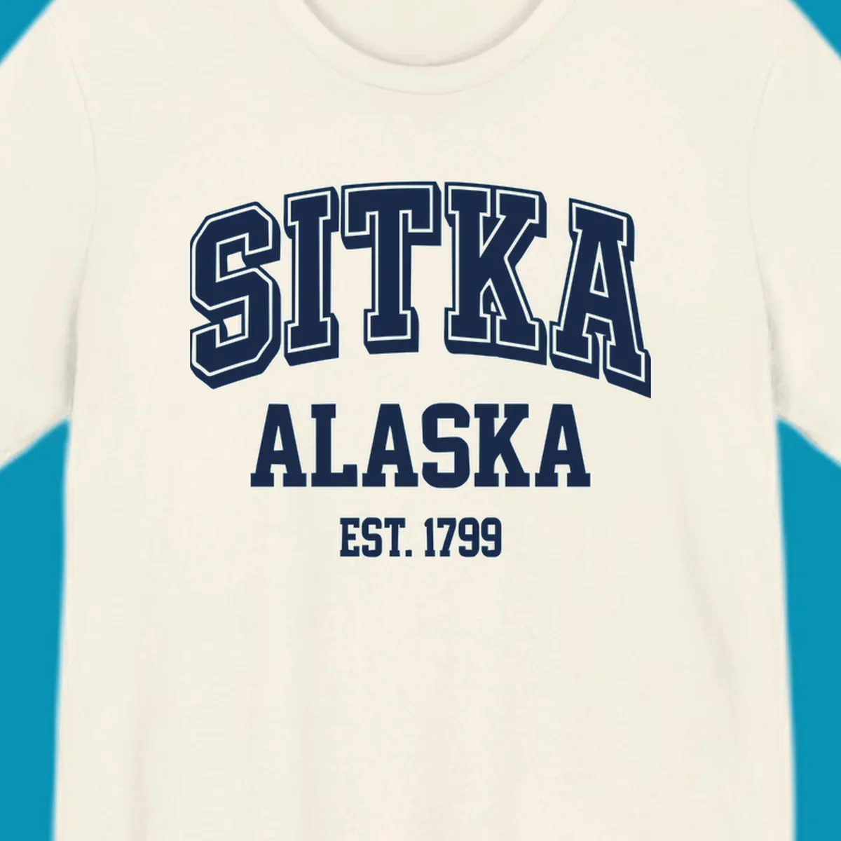 Vintage badge design reading Sitka Alaska Est. 1799 in bold outlined and solid white lettering on gray background