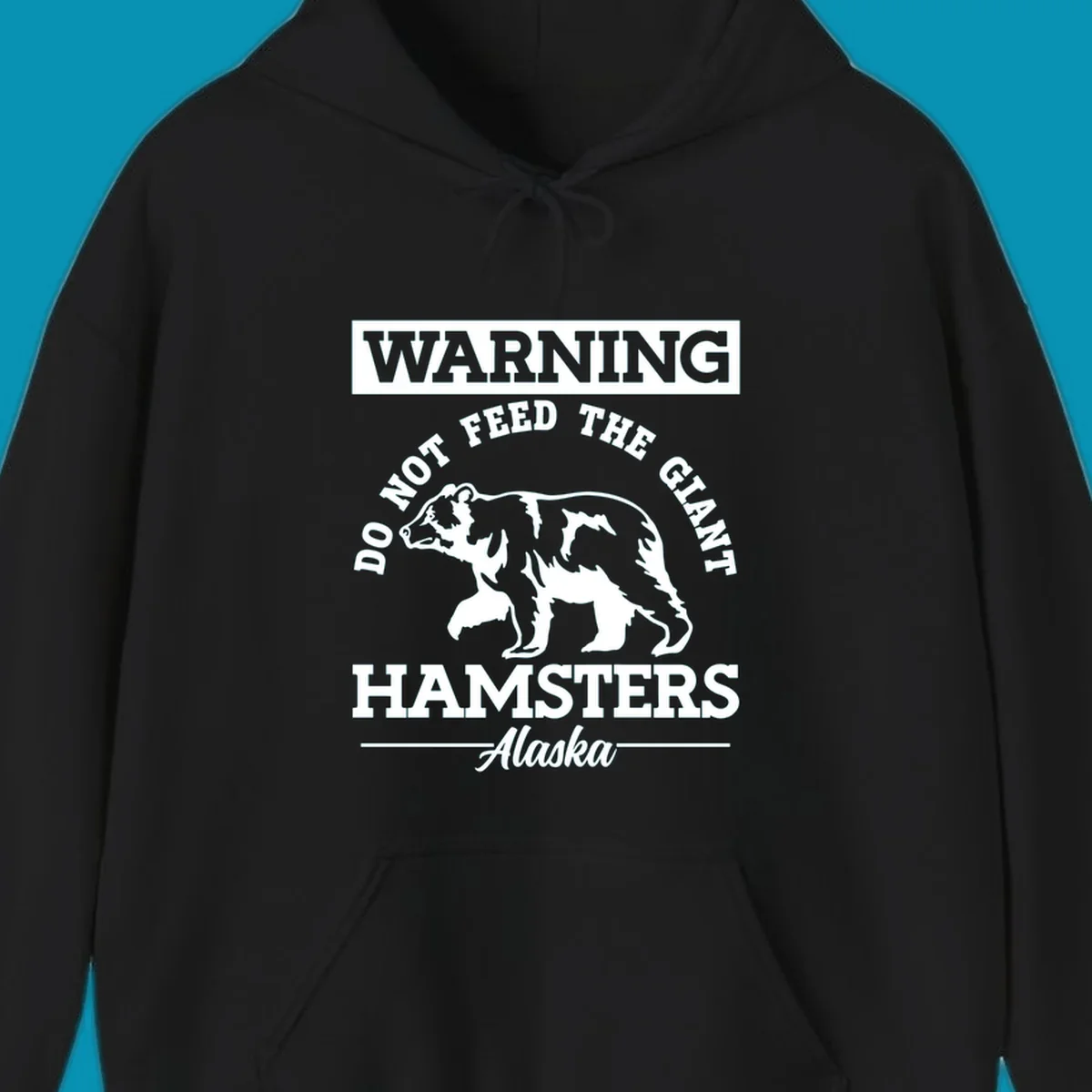 Gray and white warning sign design featuring a bear silhouette with text 'Do Not Feed The Giant Hamsters Alaska' for cruise apparel