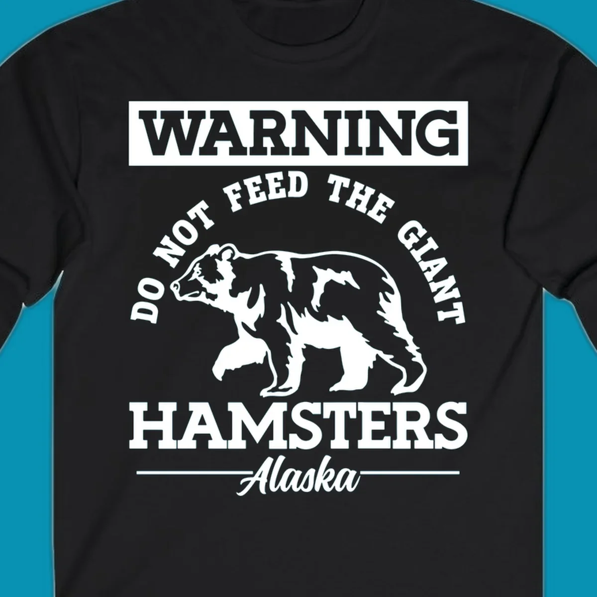 Gray and white warning sign design featuring a bear silhouette with text 'Do Not Feed The Giant Hamsters Alaska' for cruise apparel