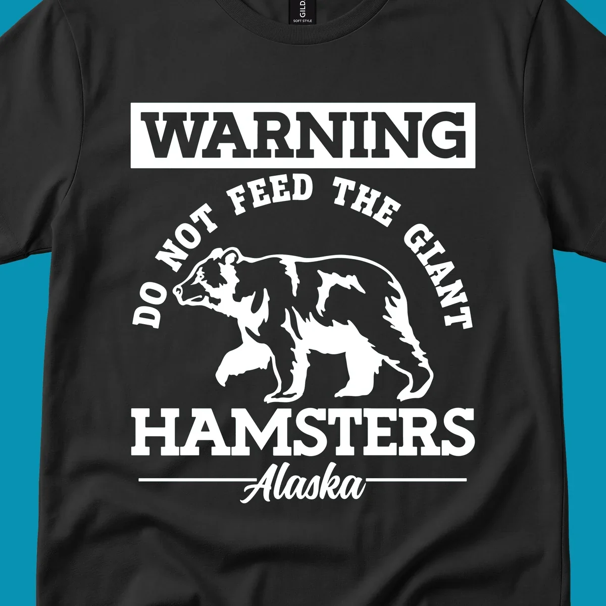 Gray and white warning sign design featuring a bear silhouette with text 'Do Not Feed The Giant Hamsters Alaska' for cruise apparel