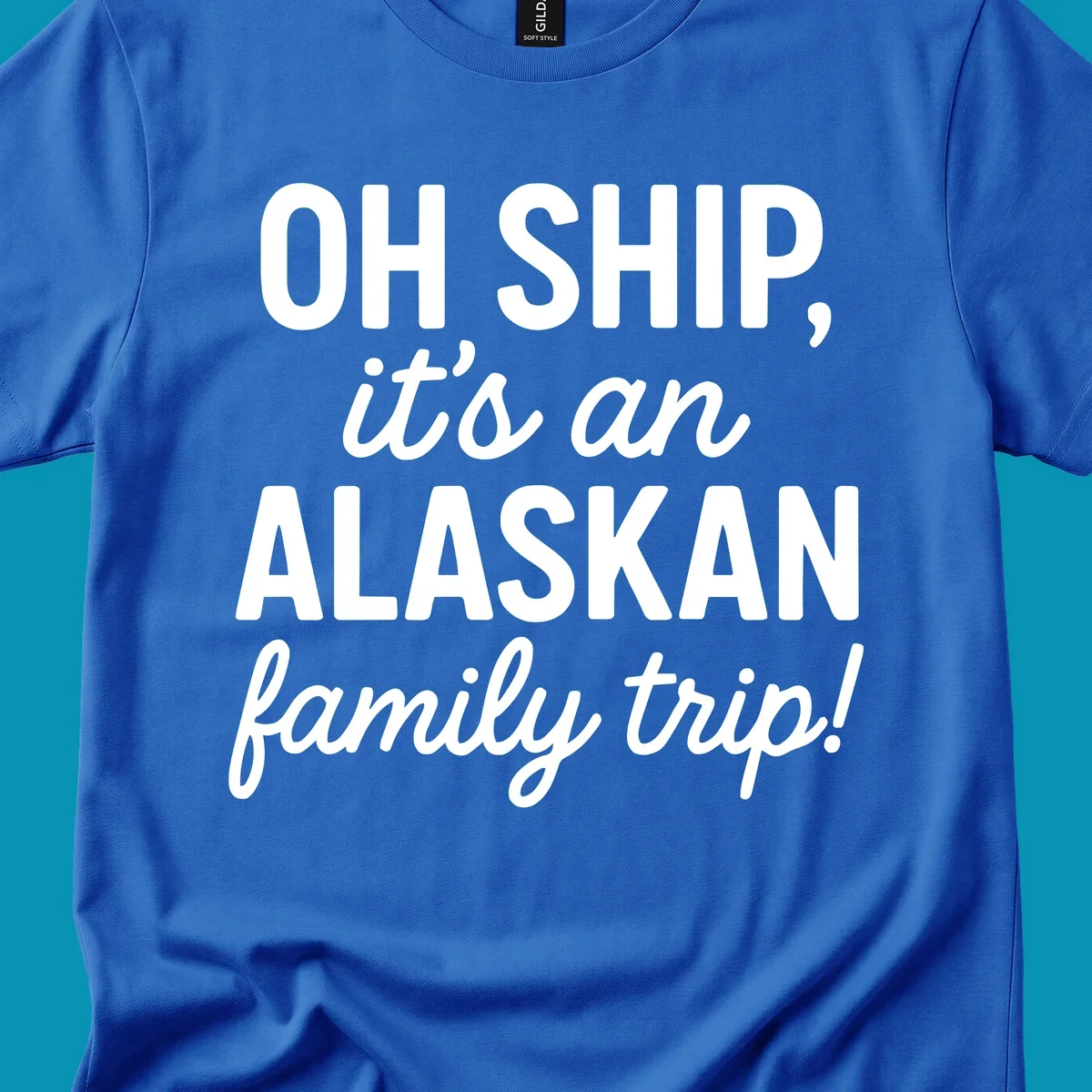 White text on gray background reading 'OH SHIP, it's an ALASKAN family trip!' with bold and italic lettering for an Alaskan cruise design