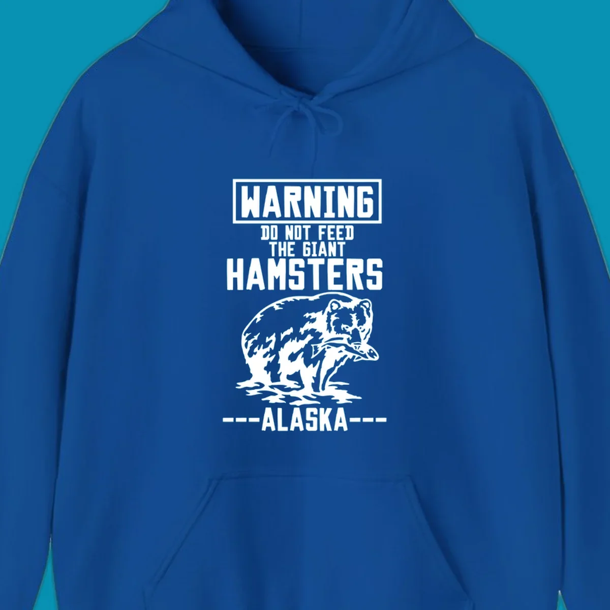 Warning-style design with giant hamster illustration and text reading 'Do Not Feed The Giant Hamsters Alaska' in white lettering on gray background