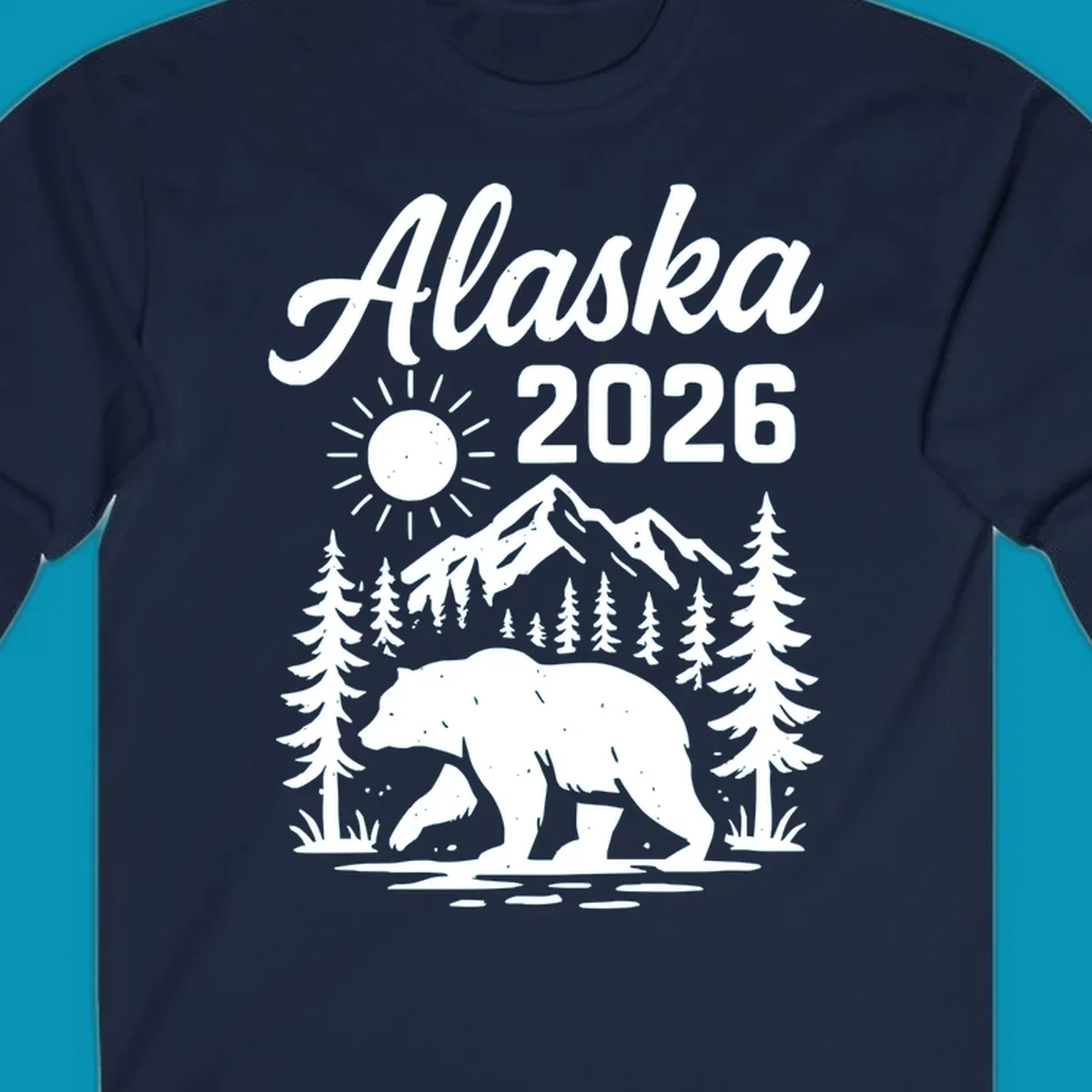 Alaska 2026 design featuring a polar bear walking through snowy mountains surrounded by evergreen trees and bright sun