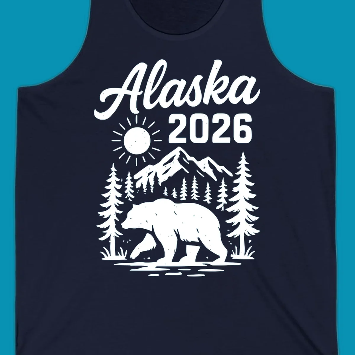 Alaska 2026 design featuring a polar bear walking through snowy mountains surrounded by evergreen trees and bright sun