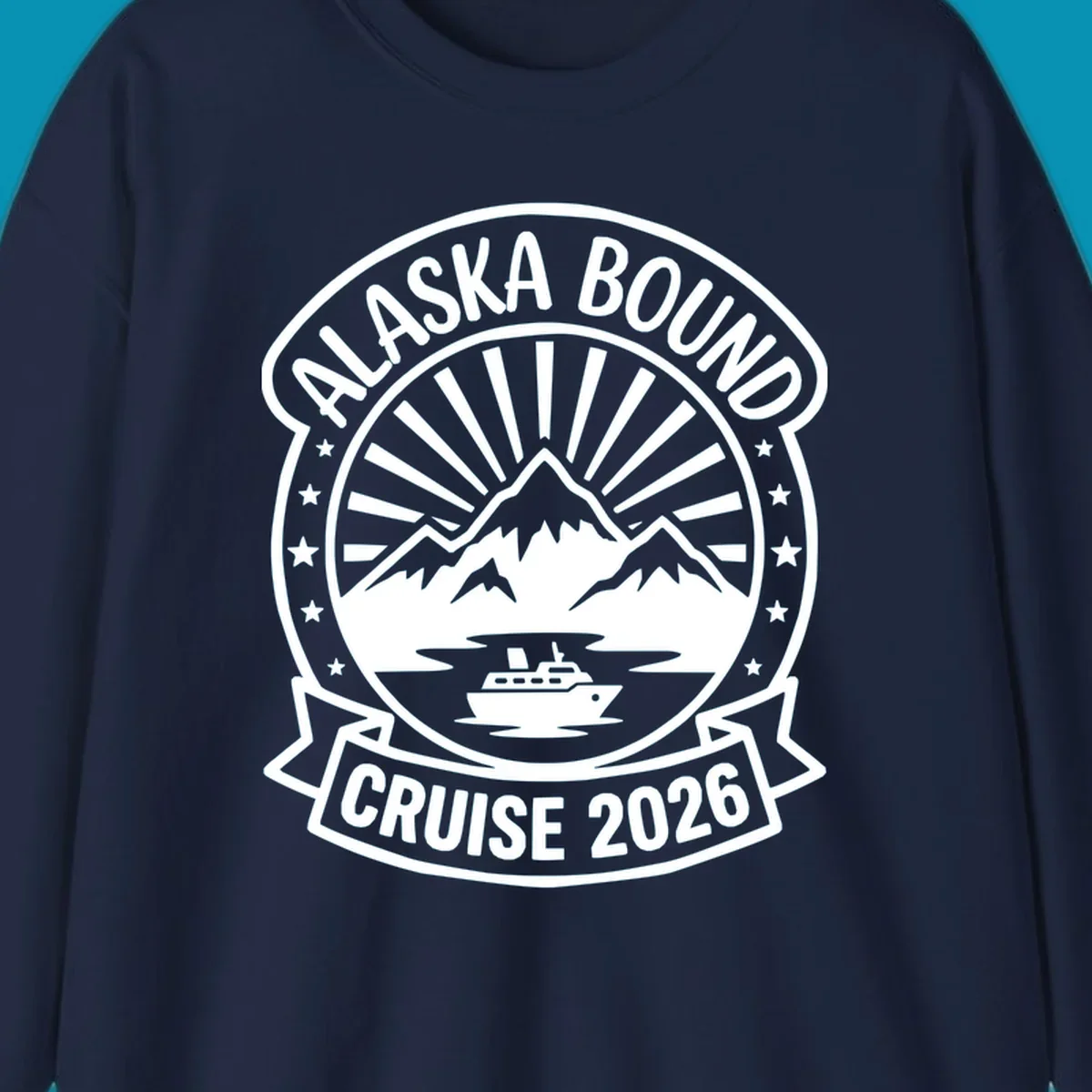 Vintage circular badge with 'Alaska Bound Cruise 2026' text, featuring snow-capped mountains, cruise ship, and radiating sun rays