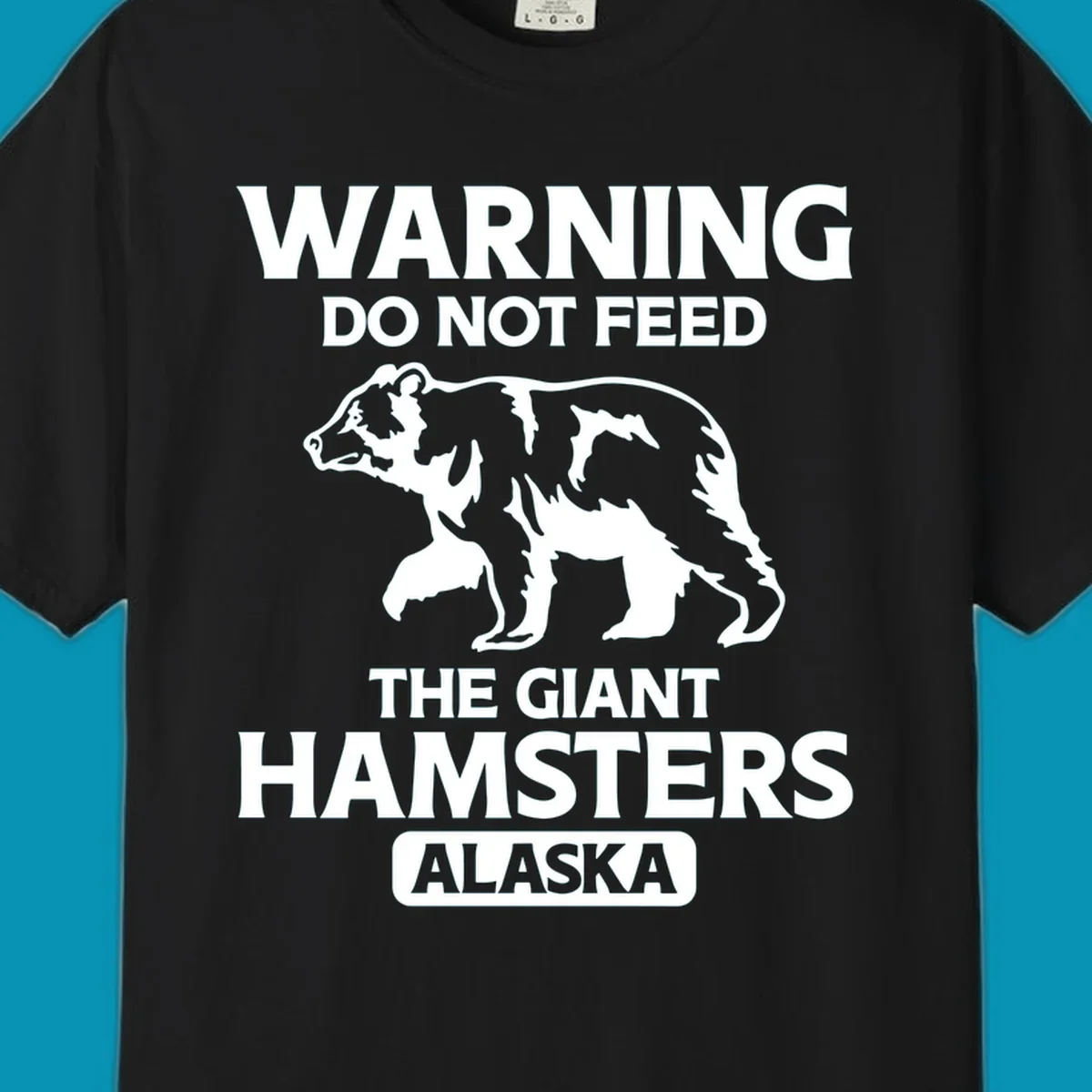 White bear silhouette with bold warning text 'Do Not Feed The Giant Hamsters Alaska' on gray background