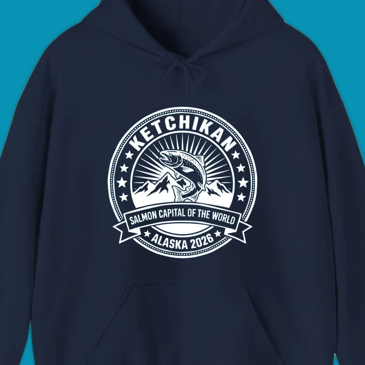 Ketchikan salmon capital badge with leaping salmon, mountain peaks, stars, and circular frame design