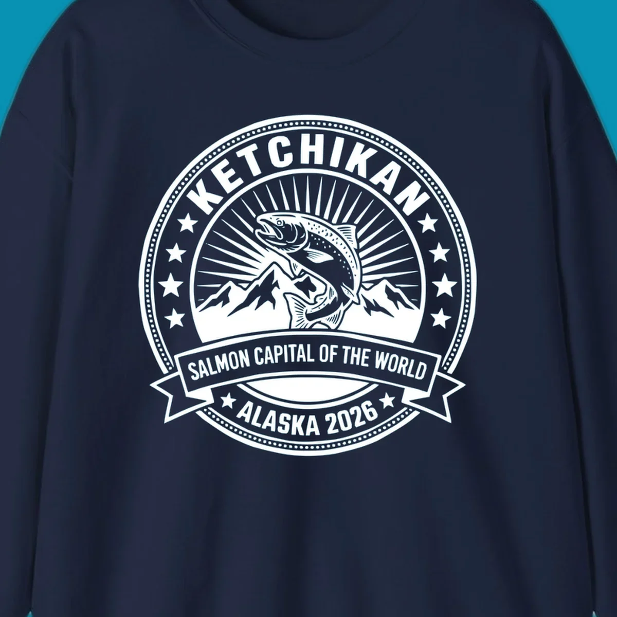 Ketchikan salmon capital badge with leaping salmon, mountain peaks, stars, and circular frame design