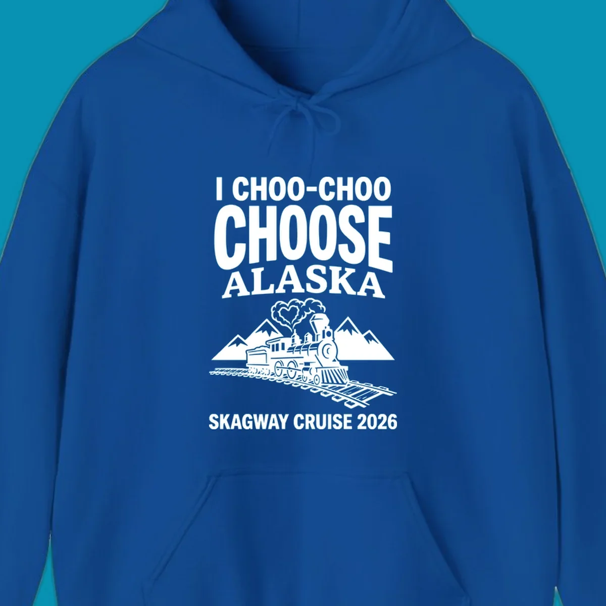 Choo-choo-choose-skagway design: vintage steam locomotive on tracks with mountains and heart-shaped steam cloud, text reads I Choo-Choo Choose Alaska Skagway Cruise 2026