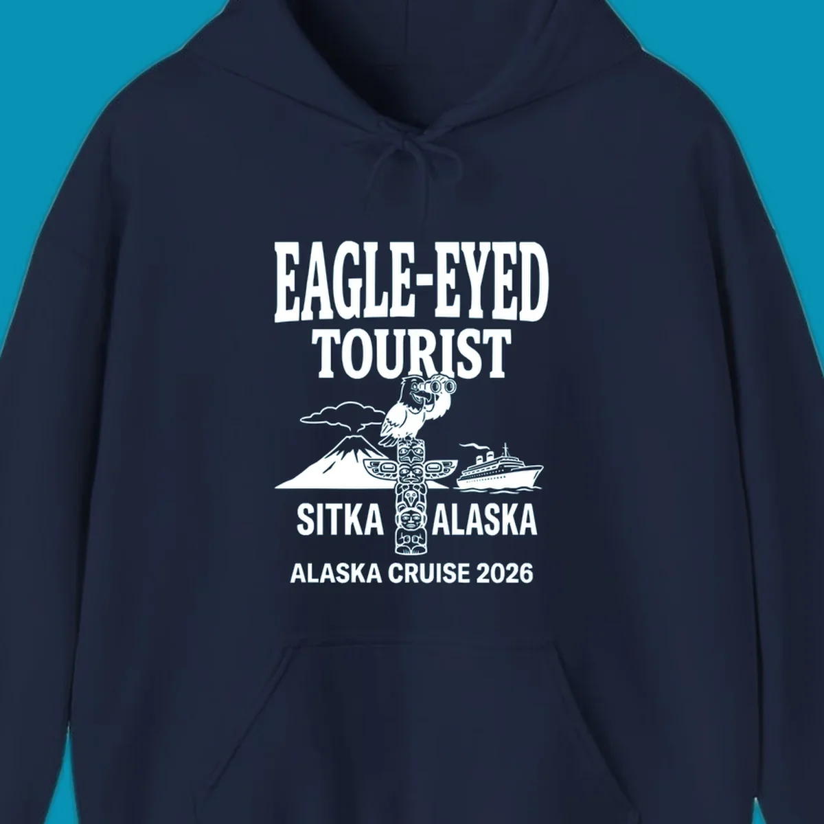 Eagle-eyed tourist design featuring a bald eagle with binoculars, snow mountain, totem pole, and cruise ship for Sitka Alaska 2026