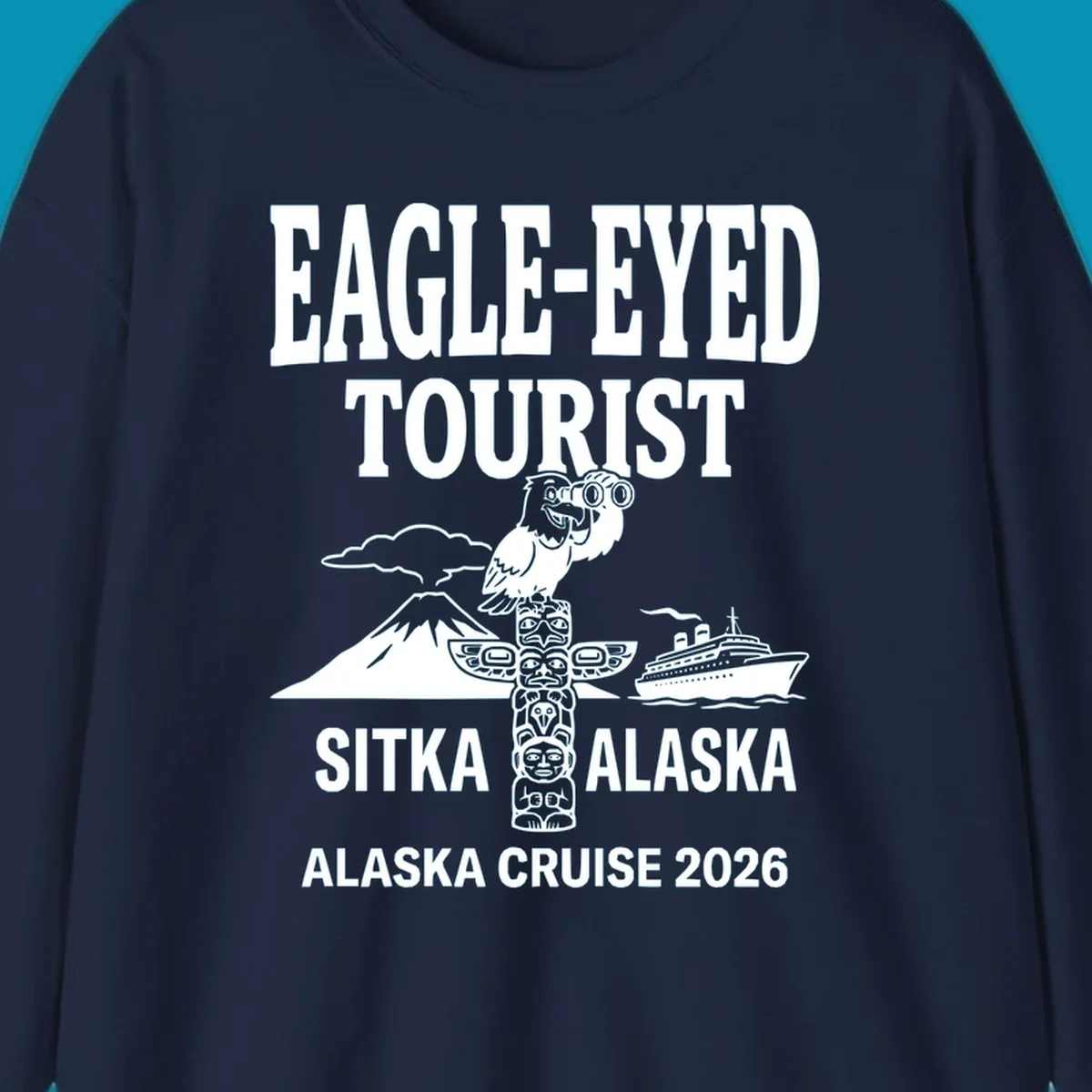 Eagle-eyed tourist design featuring a bald eagle with binoculars, snow mountain, totem pole, and cruise ship for Sitka Alaska 2026