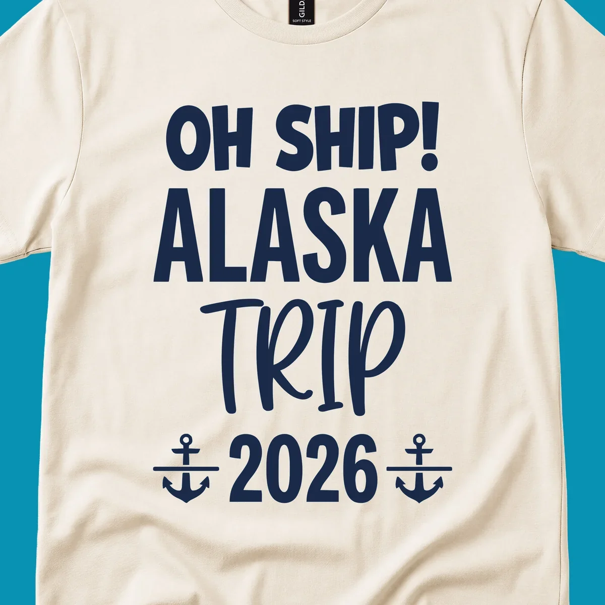 White text on gray background reading 'OH SHIP! ALASKA TRIP 2026' with anchor symbols, a playful cruise vacation design