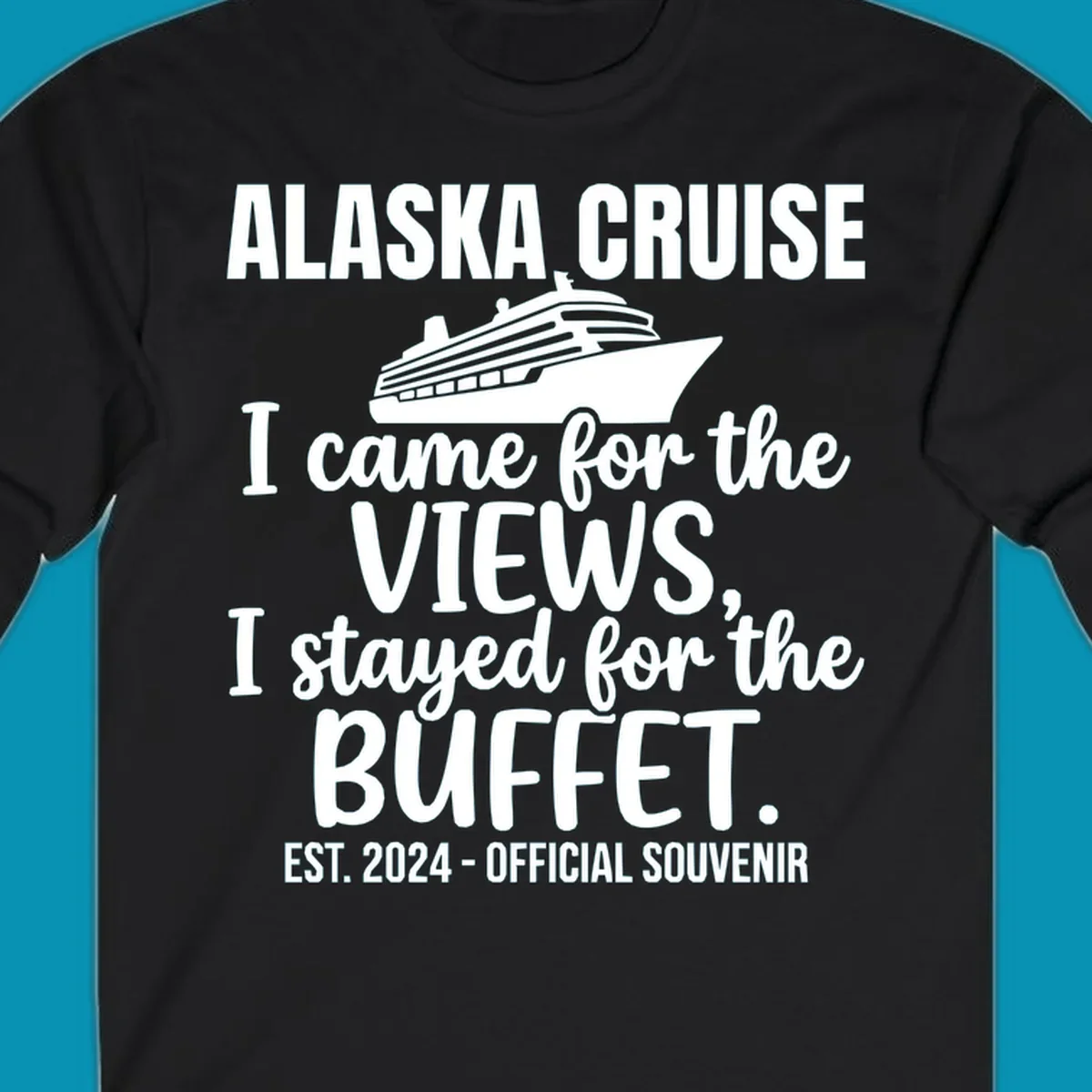 Gray t-shirt design with white cruise ship illustration and text reading 'I came for the views, I stayed for the buffet' — a funny Alaska cruise souvenir design